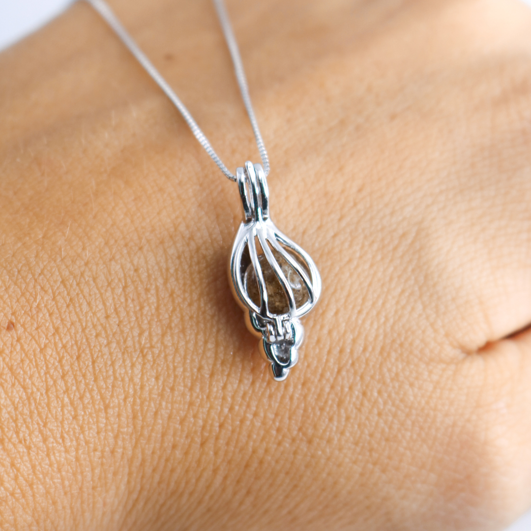 Colgante con perla de cenizas "Caracola"