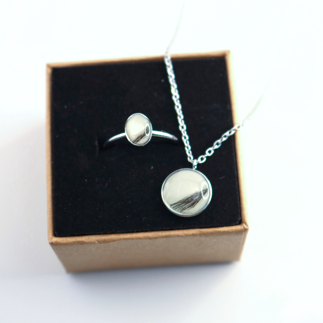 Colgante redondo de acero inoxidable con pelo